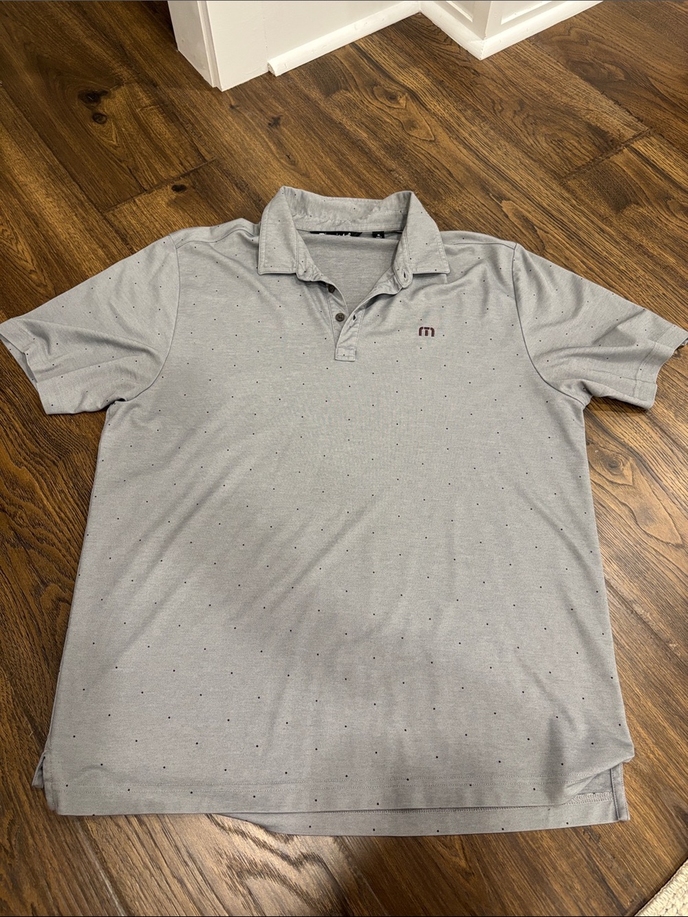 TravisMathew Light Gray Polo with Subtle Dot Accent